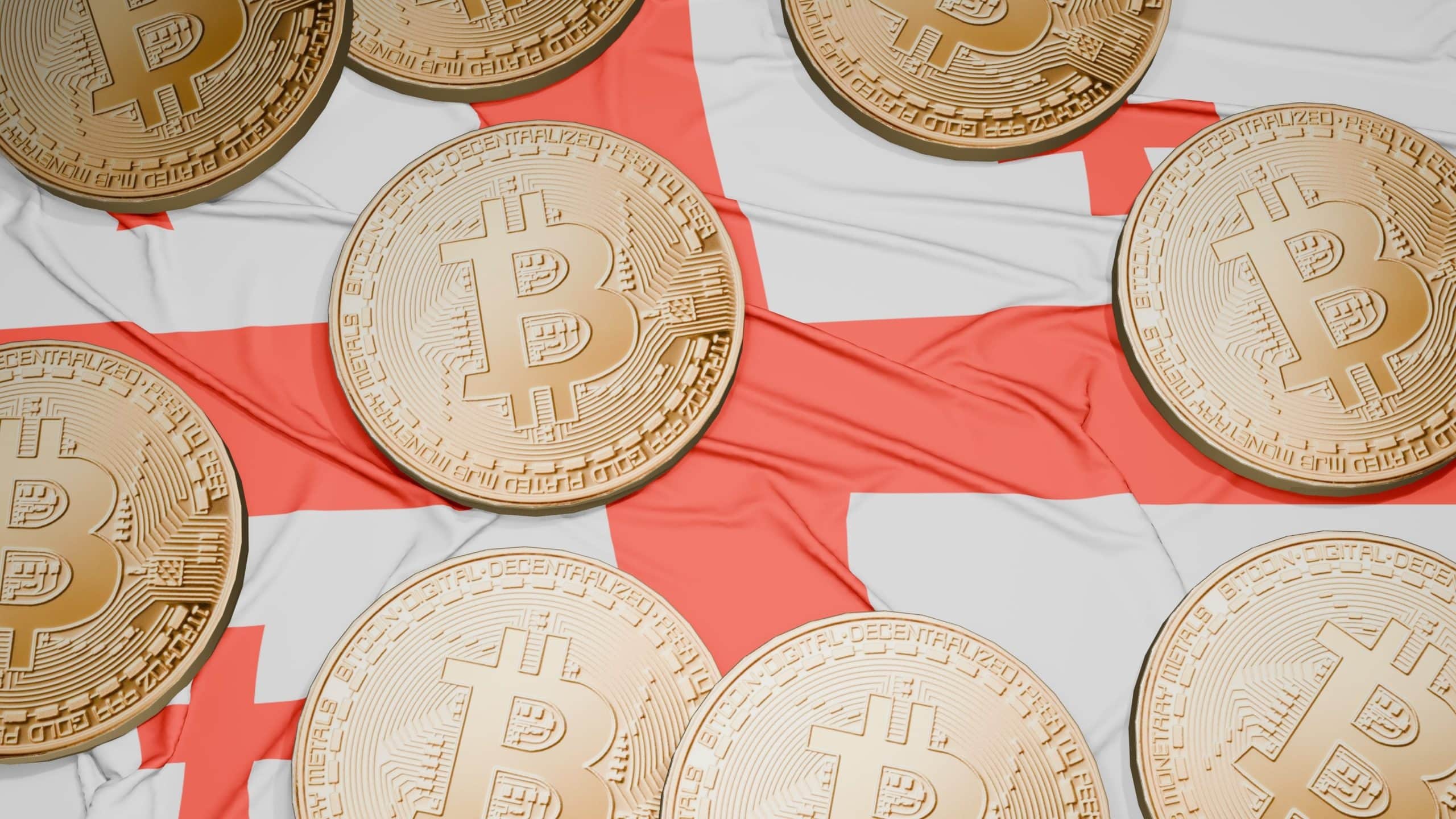 Das Bild zeigt die georgische Flagge und Bitcoin-Münzen