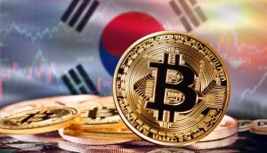 Das Bild zeigt eine Bitcoin-Münze und die südkoreanische Flagge