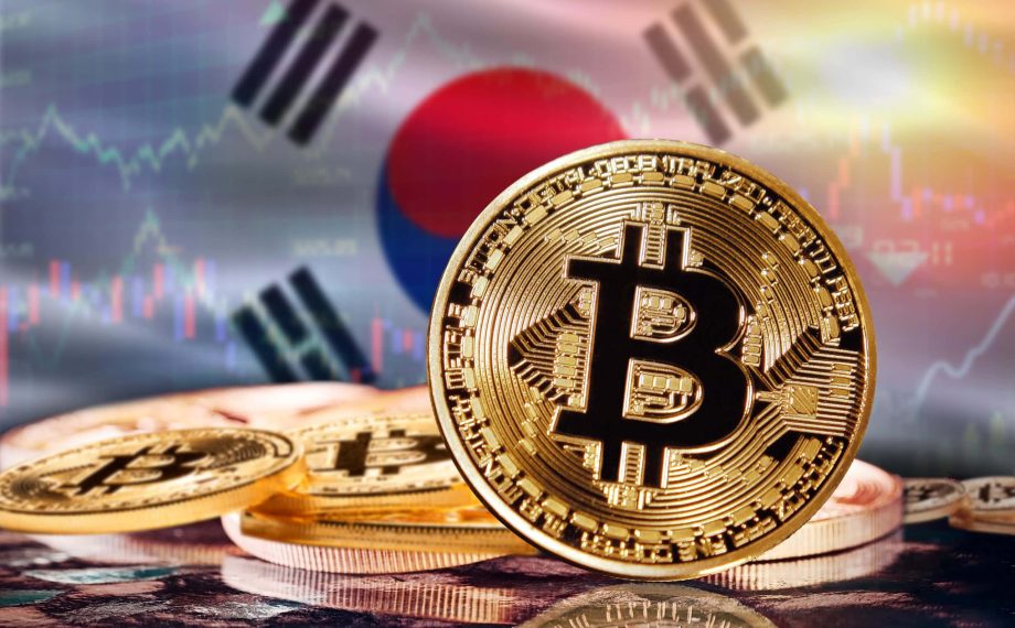 Das Bild zeigt eine Bitcoin-Münze und die südkoreanische Flagge