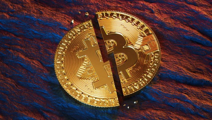 Bitcoin-Münze Eine gespaltene Bitcoin-Münze