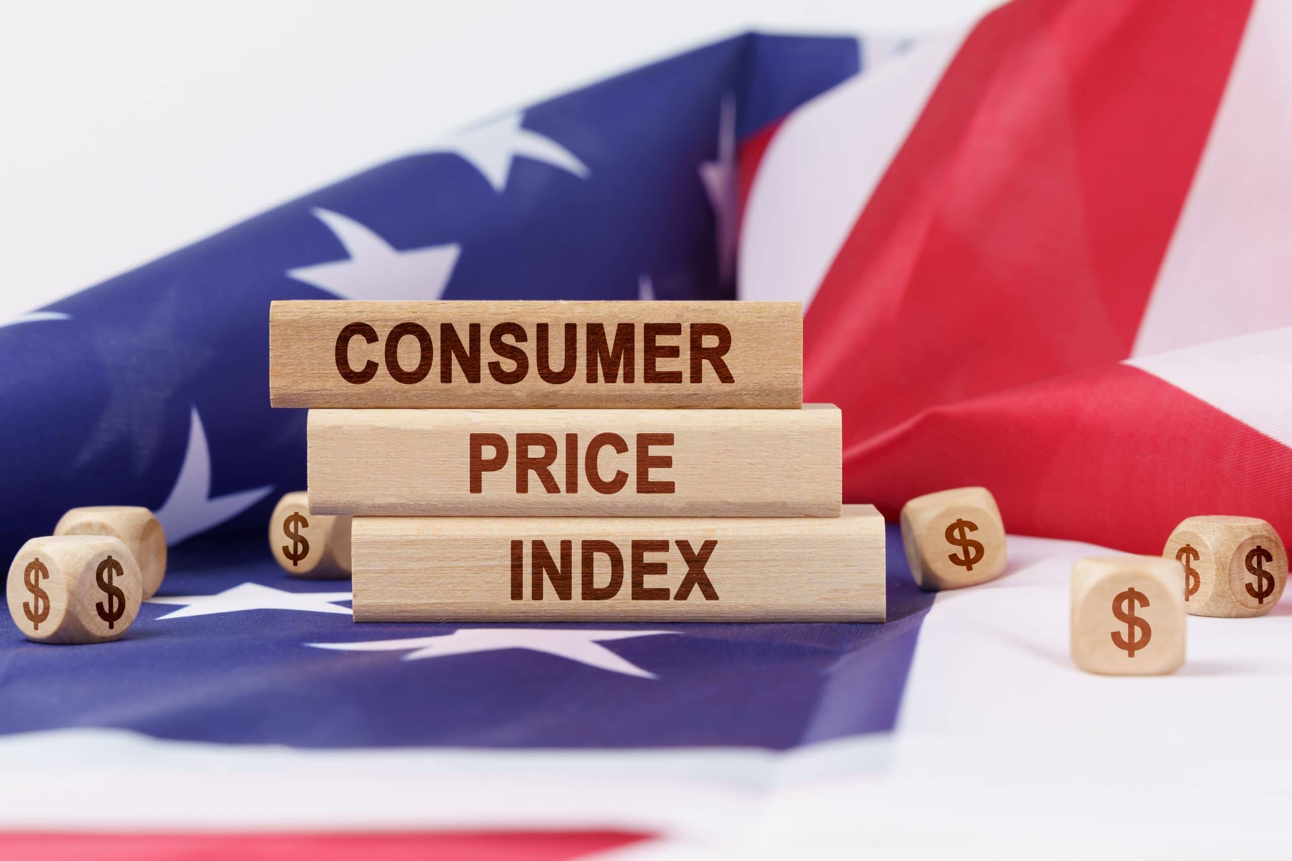 Das Bild zeigt die Worte „Consumer Price Index“ auf einer amerikanischen Flagge