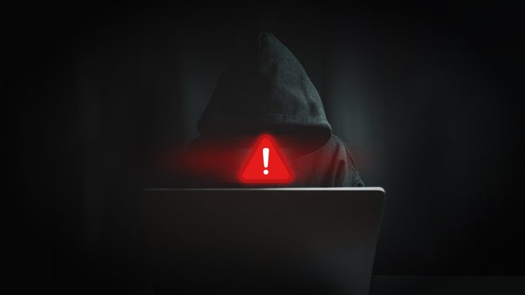 Das Bild zeigt einen Krypto-Hacker