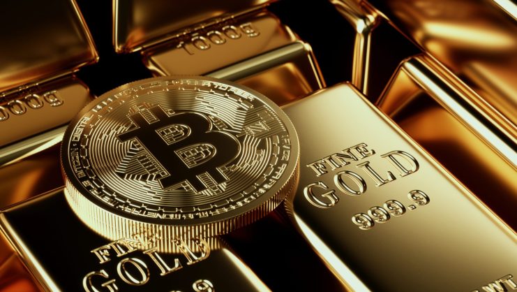 Bitcoin meets Gold Bitcoin-Münze und Gold-Barren