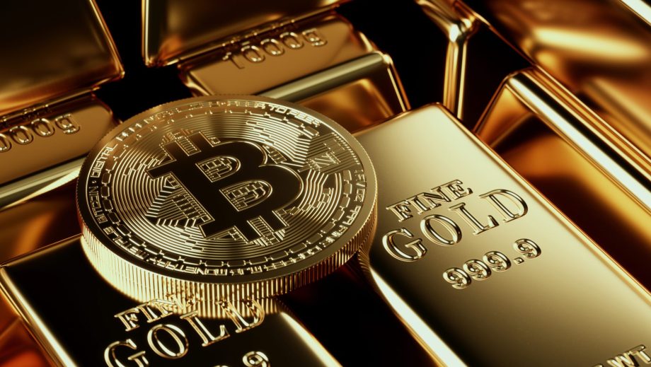 Bitcoin-Münze und Gold-Barren