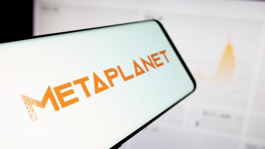 Das Bild zeigt das Metaplanet-Logo auf einem Smartphone