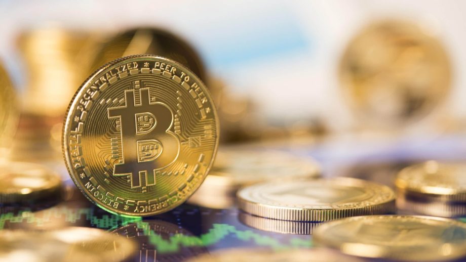 Das Bild zeigt eine Bitcoin-Münze